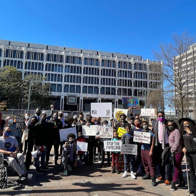 Memphis Community Against Pollution group holding protest signs